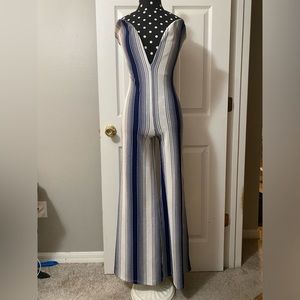 Gorgeous pantsuit! henrigirl. Size small.